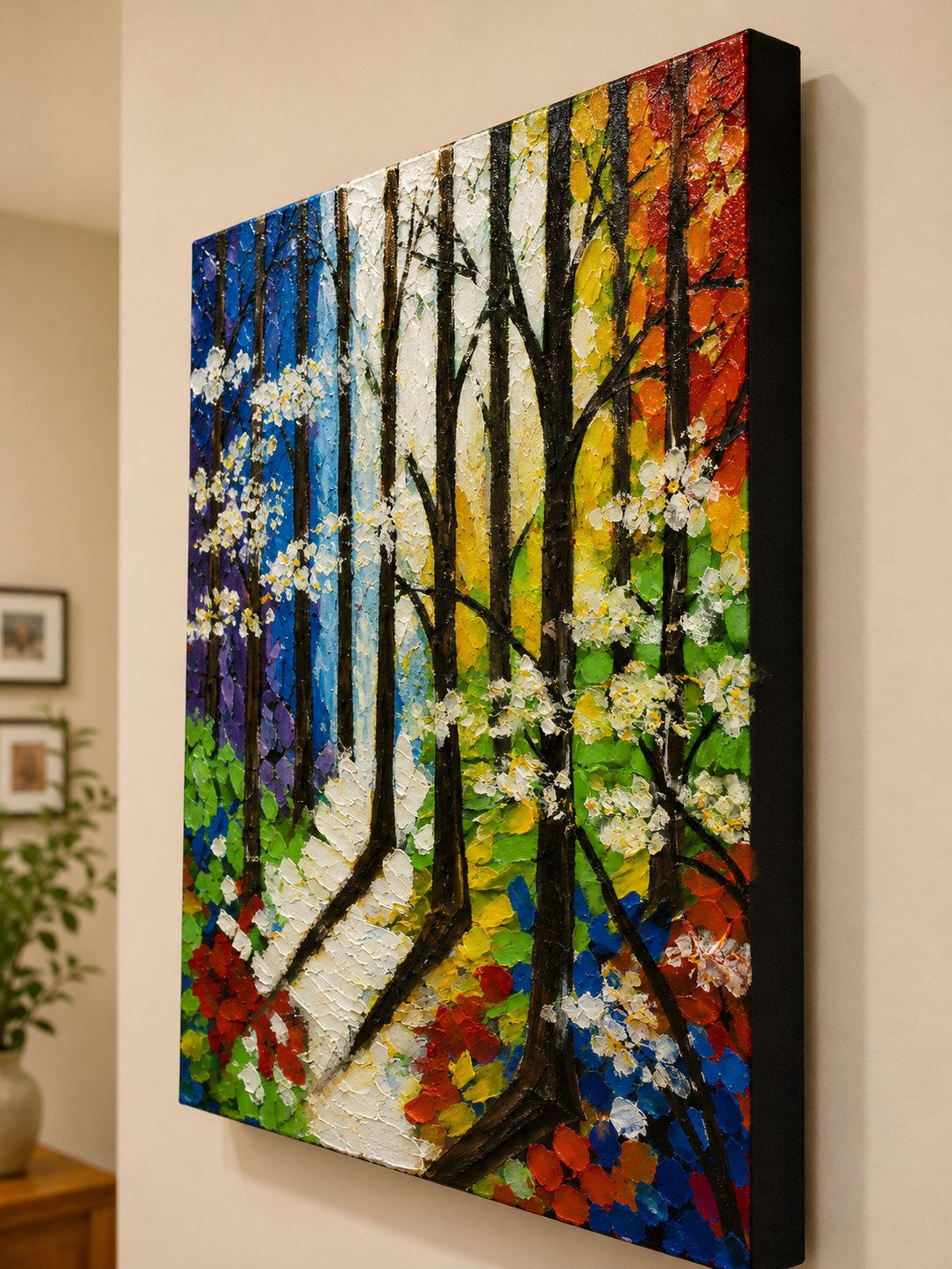 Side-angle view of Path of Seasons canvas artwork displaying surface texture depth and layered paint application.