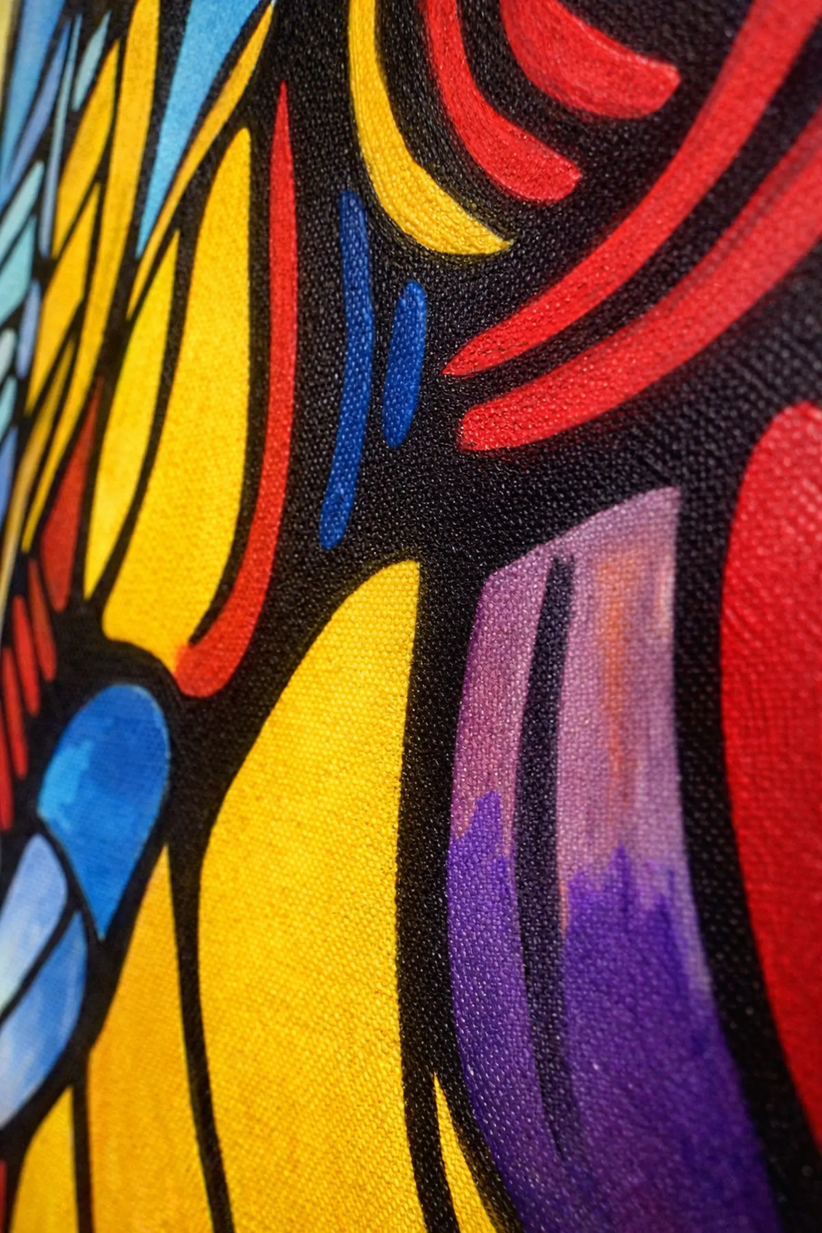 Macro brushstroke detail of Timeless Wisdom elephant painting with vivid colors and bold black outlines