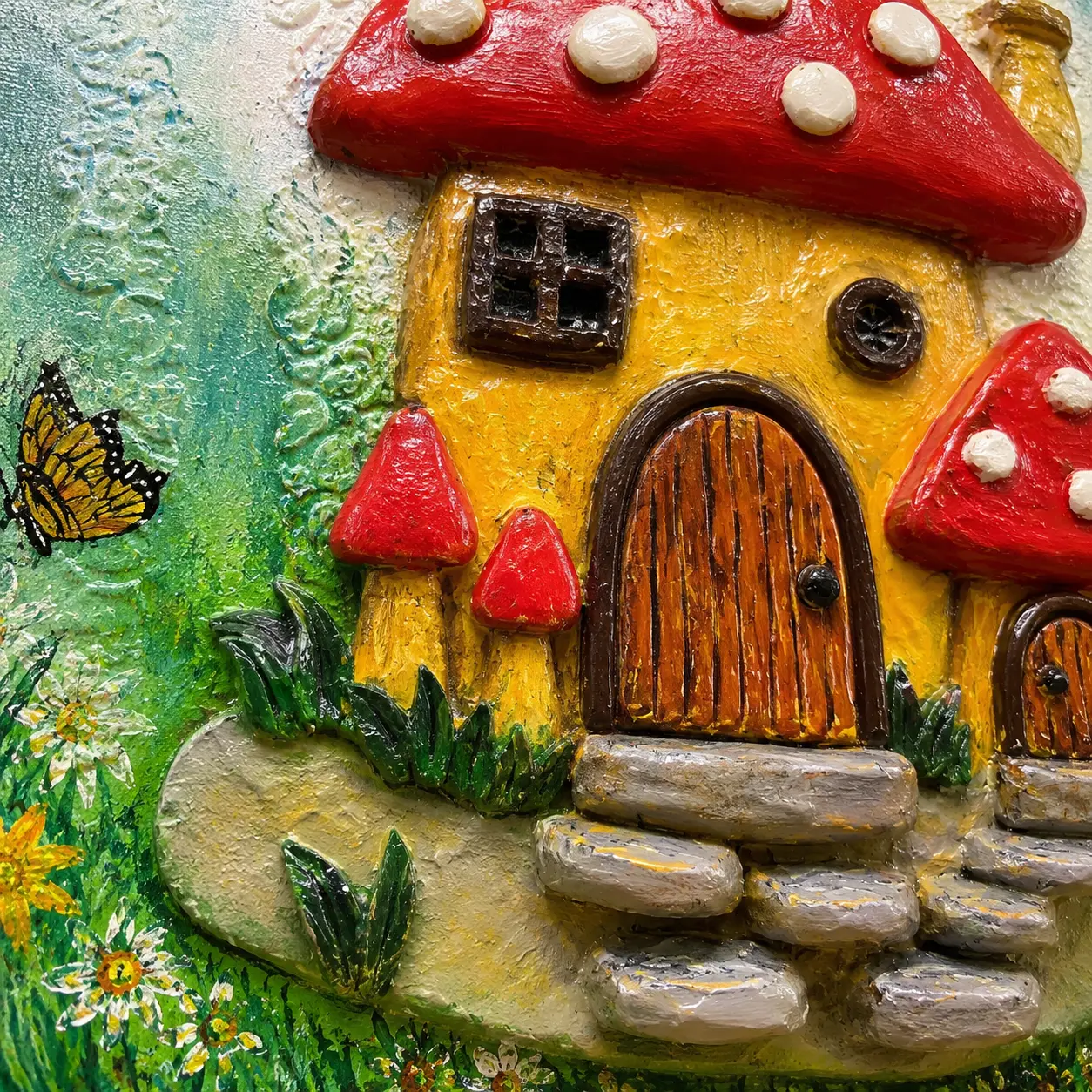 Close-up view of sculpted clay mushroom roof, cottage details, and handcrafted dimensional textures in Enchanted Mushroom Cottage artwork.